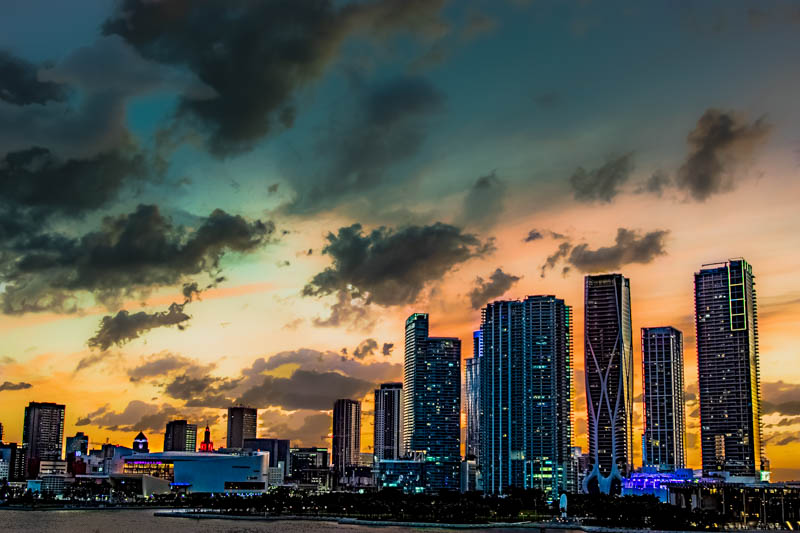 Biscayne Bay at dusk — Miami skyline reflected in the still water